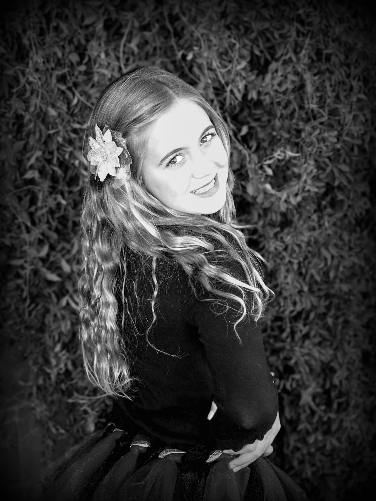 Black and white portrait of Lexi Schultz smiling